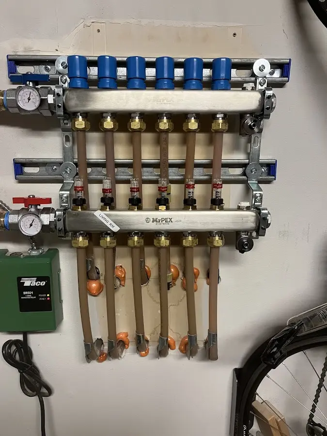 Plumber performing Water Heater Repair at a residential property in Burnet